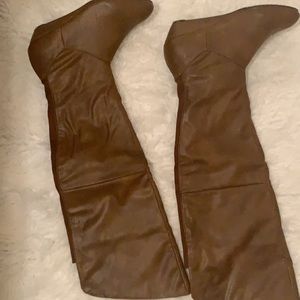 Thigh high brown boots